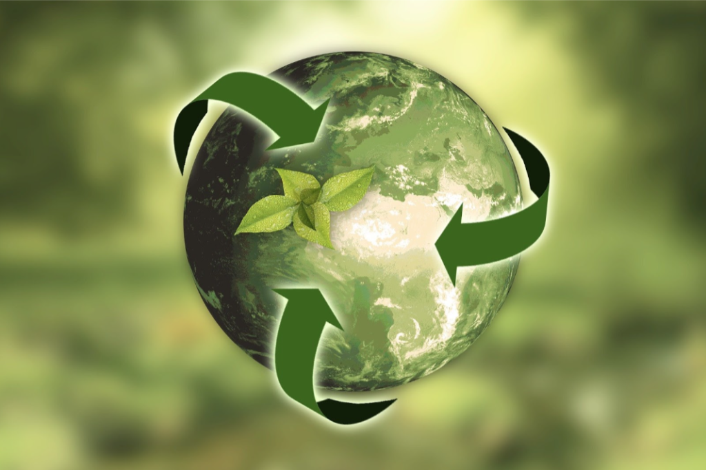 Green earth with arrows and growing plant symbolizing sustainability in promotional products.